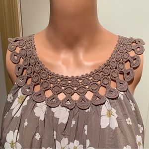 NWILLOW. Daisy printed bubble style top with lace straps. Size M. Fully …